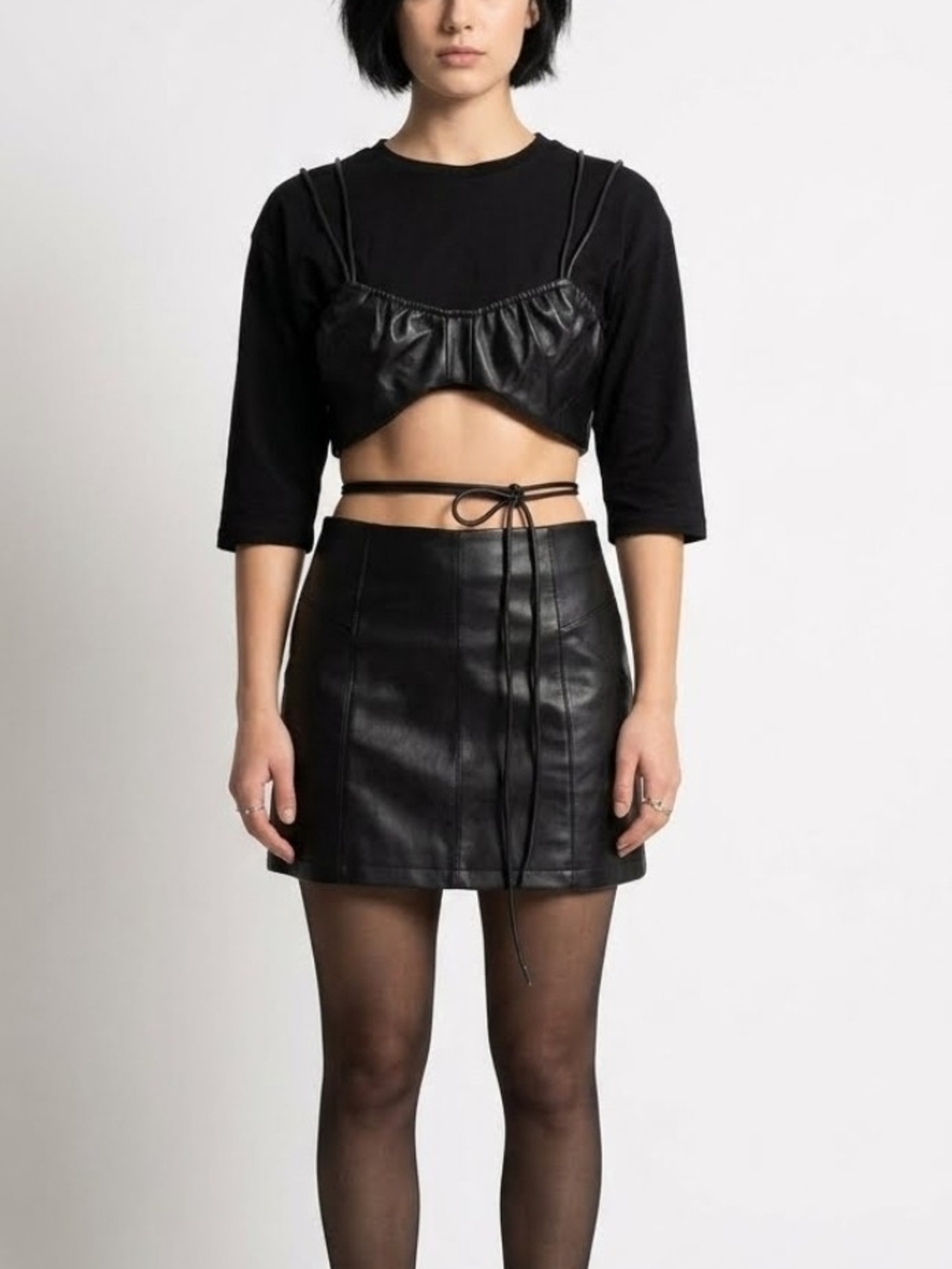 This Maniere De Voir top features faux leather overlays on a cropped design.